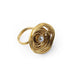 Gold ring with a pearl at the center on a white background