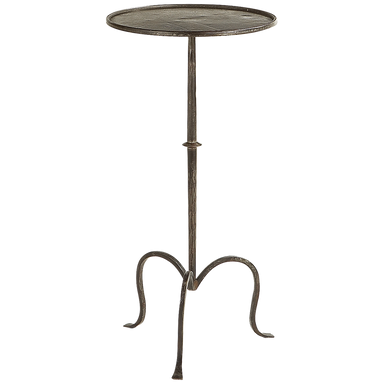 This image features a sophisticated Martini table crafted in aged iron. The table boasts a classic, elegant design with a circular top and a distinct antique finish, enhancing its visual appeal.