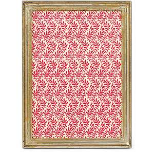 Framed artwork with a red and white pattern on a white background