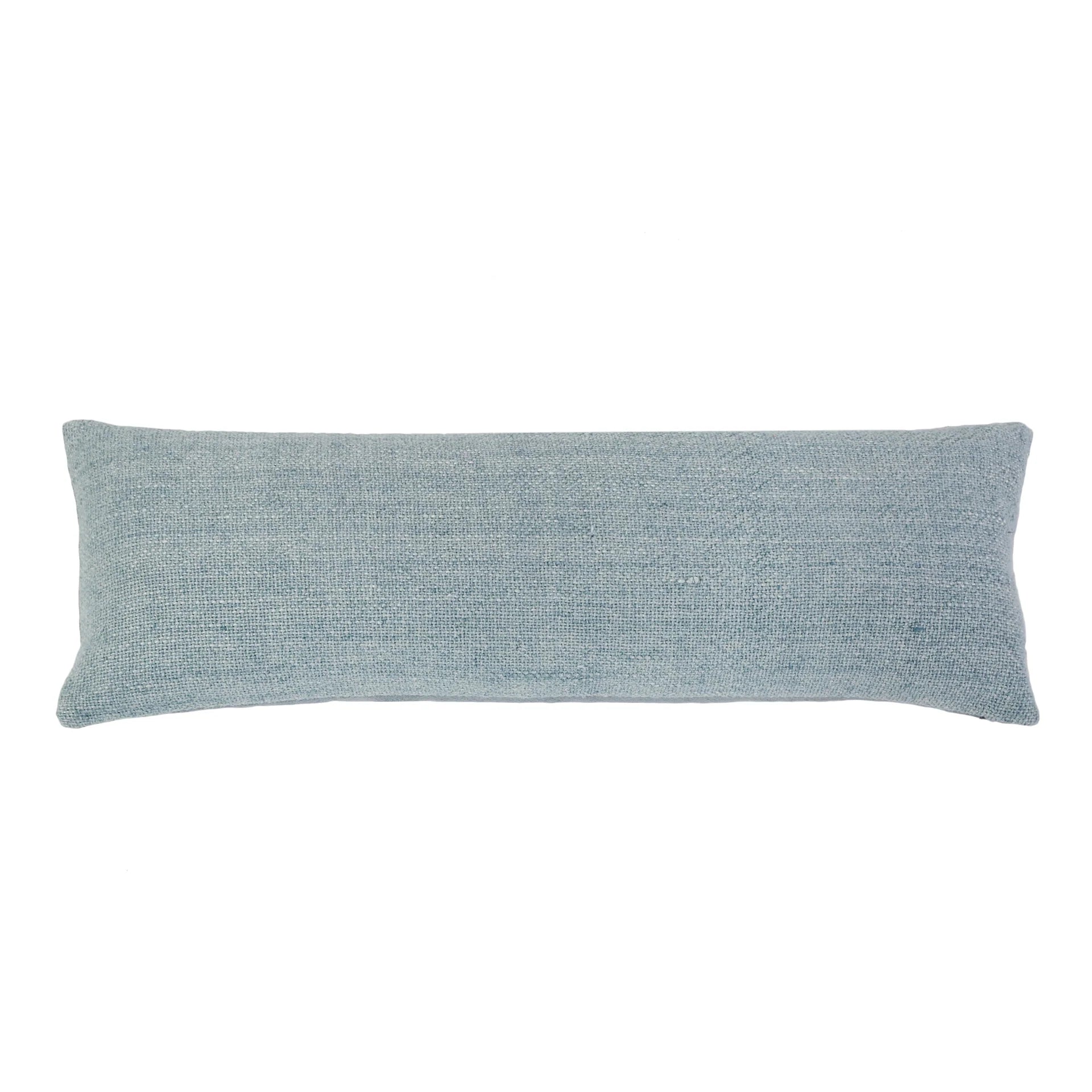 Rectangular blue cushion on a white background