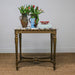 antique marble-top table with gold legs set with pottery