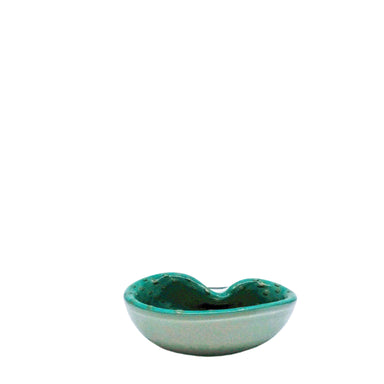 glass bowl, white on the outside, green inside