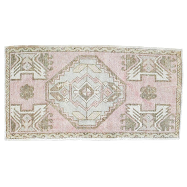 small oushak rug in pale pink and pale green