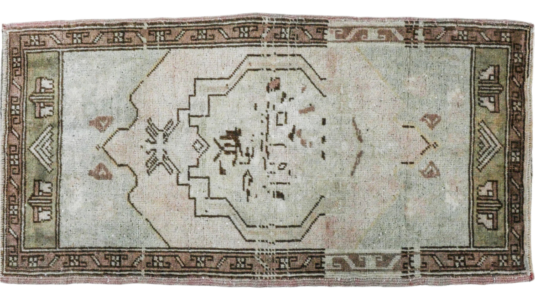 wool persian rug wiht brown border and pale green center