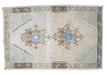 small turkish rug with bright blue center medallions