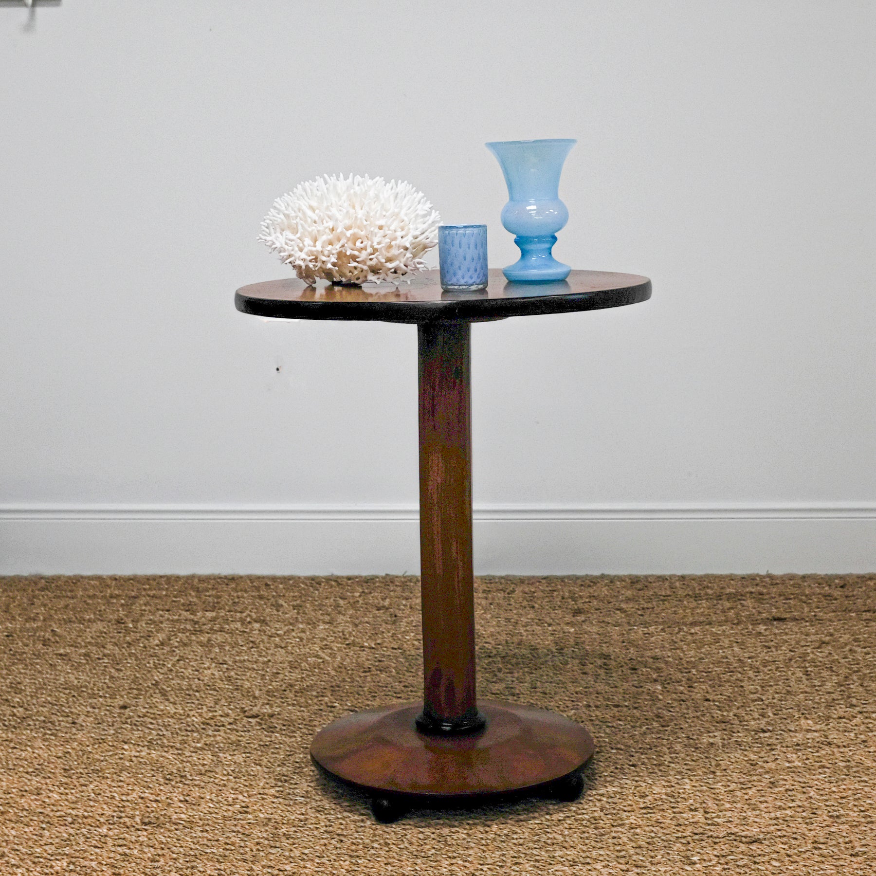 side table set with coral and blue vases