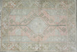 pale pink oushak with pale blue accent line