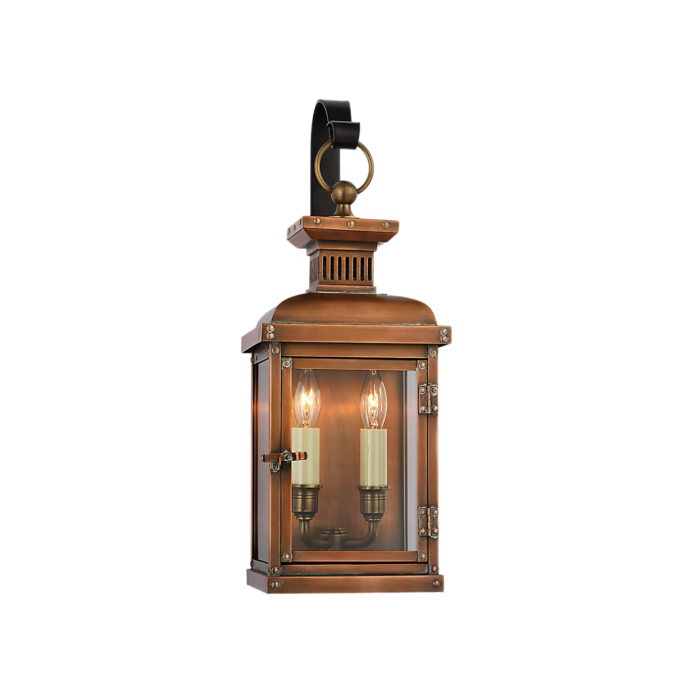 Vintage-style copper lantern with two lit candles on a white background