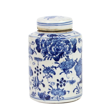 Ceramic jar with blue floral patterns on a white background