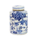 Ceramic jar with blue floral patterns on a white background