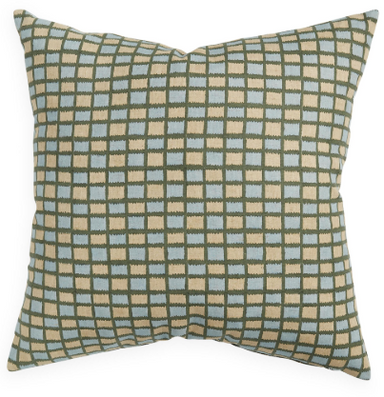 Decorative pillow with a checkered pattern on a white background
