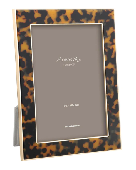 Tortoiseshell patterned photo frame with Addison Ross branding on a white background