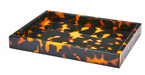 Tortoiseshell patterned tray on a white background
