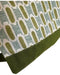 Close-up of a fabric with green and beige pattern on a white background