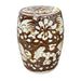 Decorative ceramic stool with floral patterns on a white background