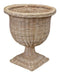 Wicker urn planter on a white background