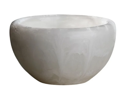 White resin bowl on a white background