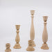 collection of turned wood candlesticks