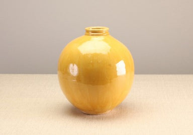 yellow small mouth jar