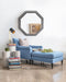 blue chair and ottoman with mirror