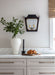 kitchen wall displaying Visual Comfort & Co.'s Caddo wall sconce from Julie Neill