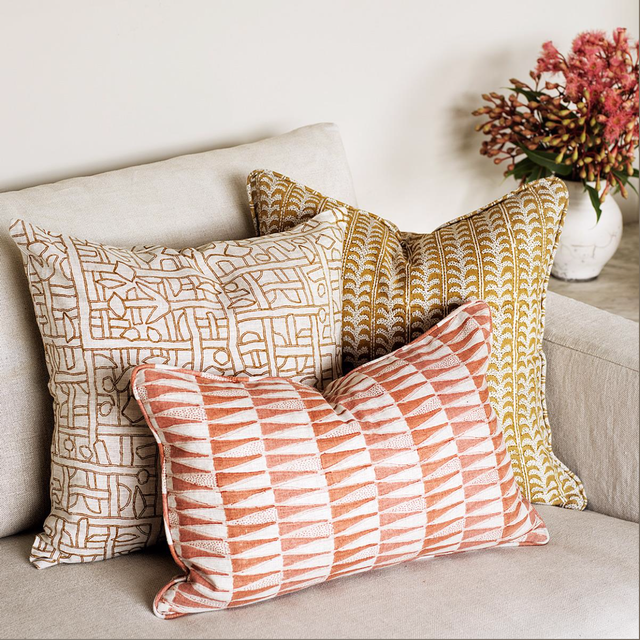 collection of saffron and guava pillows