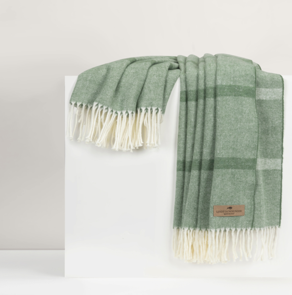 olive color and striped throw