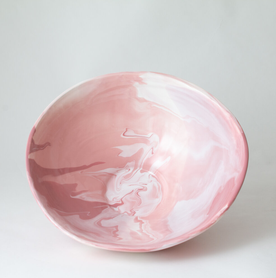 inside of pink and white bowl