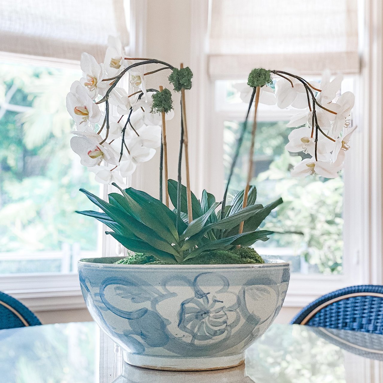 blue white bowl with orchids