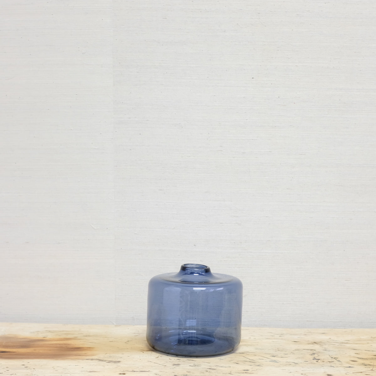 transparent blue glass bottle