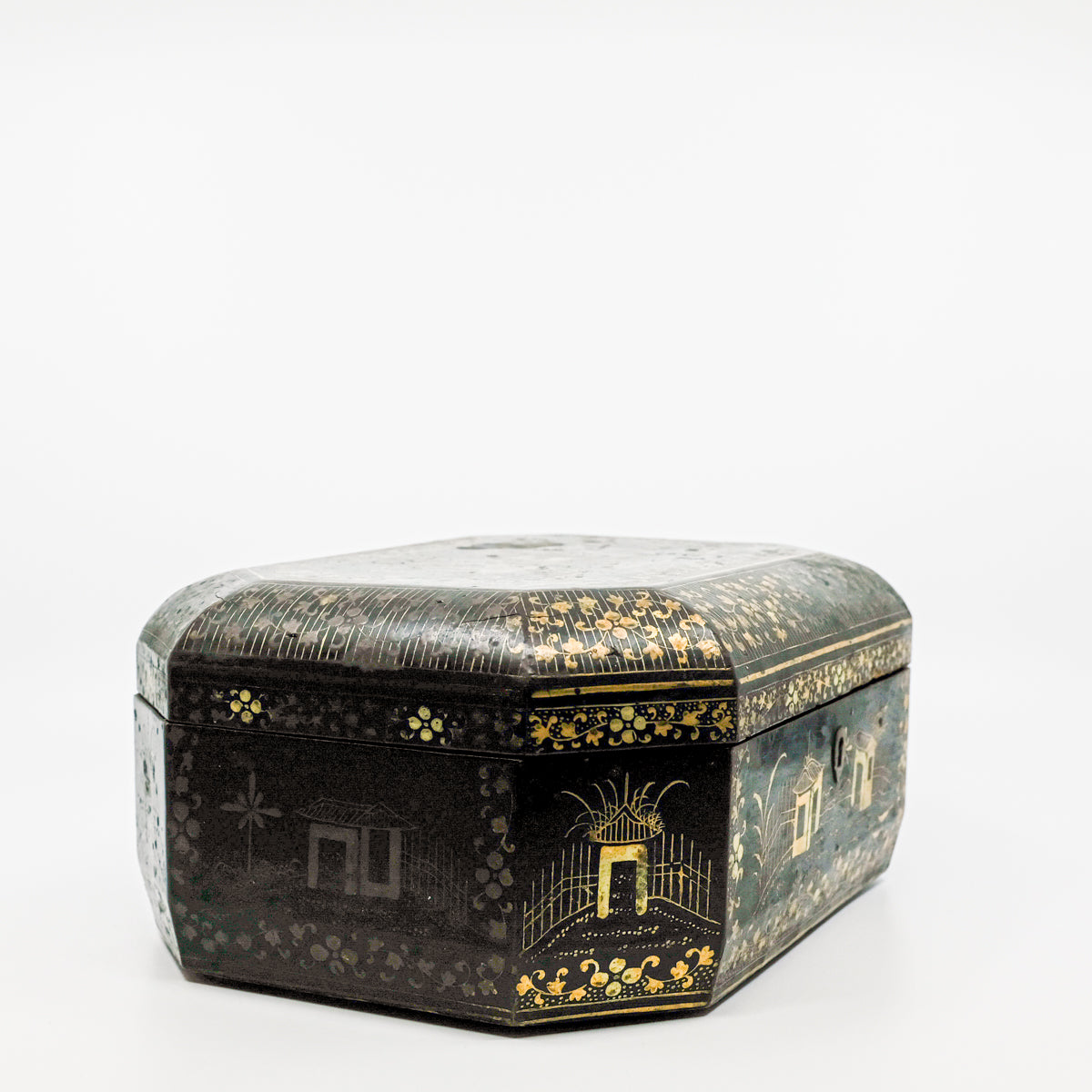 front corner view of black and gold paper marche lidded box