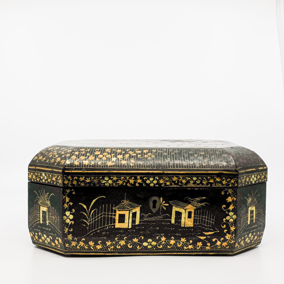 front view of black and gold paper marche lidded box