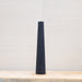 black fluted pillar candle