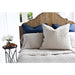 diamond quilted grand euro sham with linen pillowcases and dark blue euro shams, wood headboard