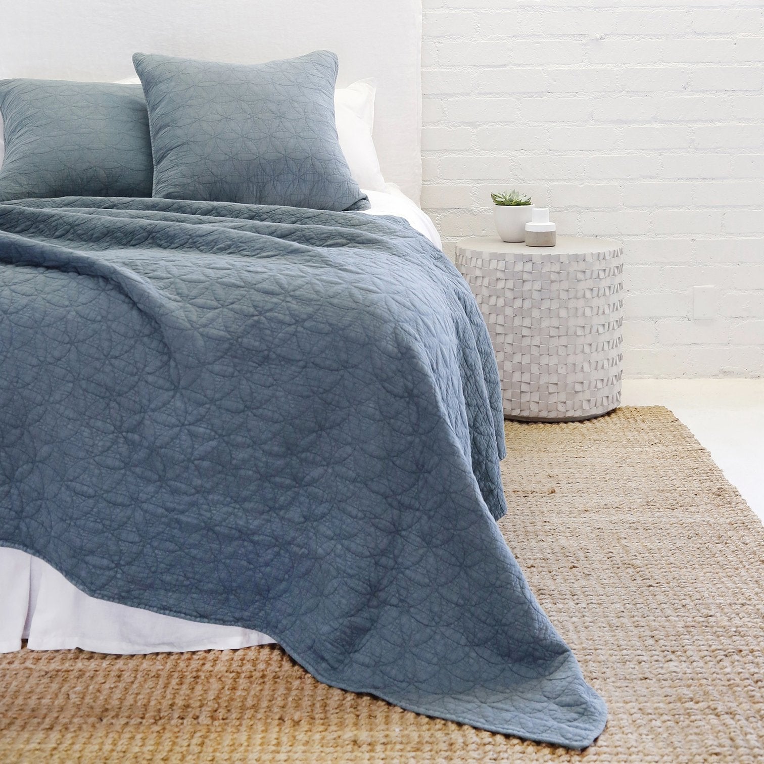 quilted coverlet and shams in blue
