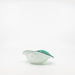 back view of white and teal bowl