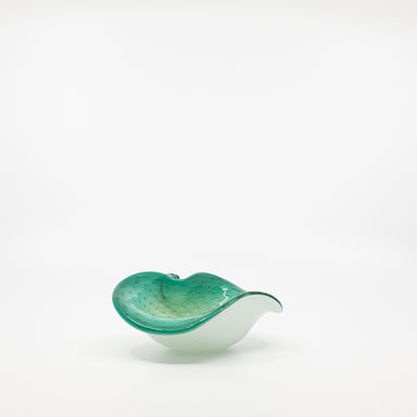 white and teal glass bowl