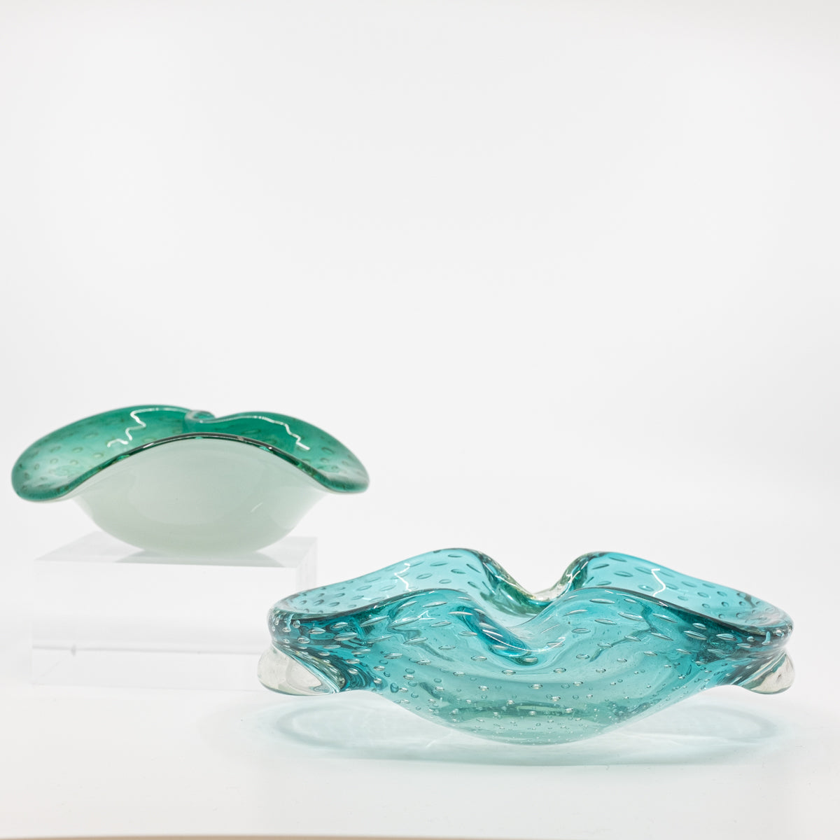 teal bowl and blue murano bowl