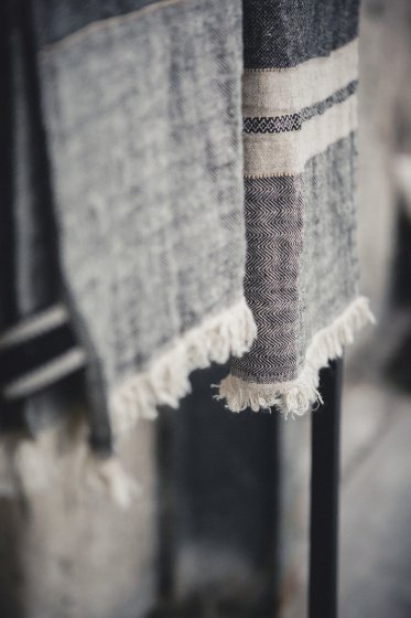 collection of gray and black striped linen towel