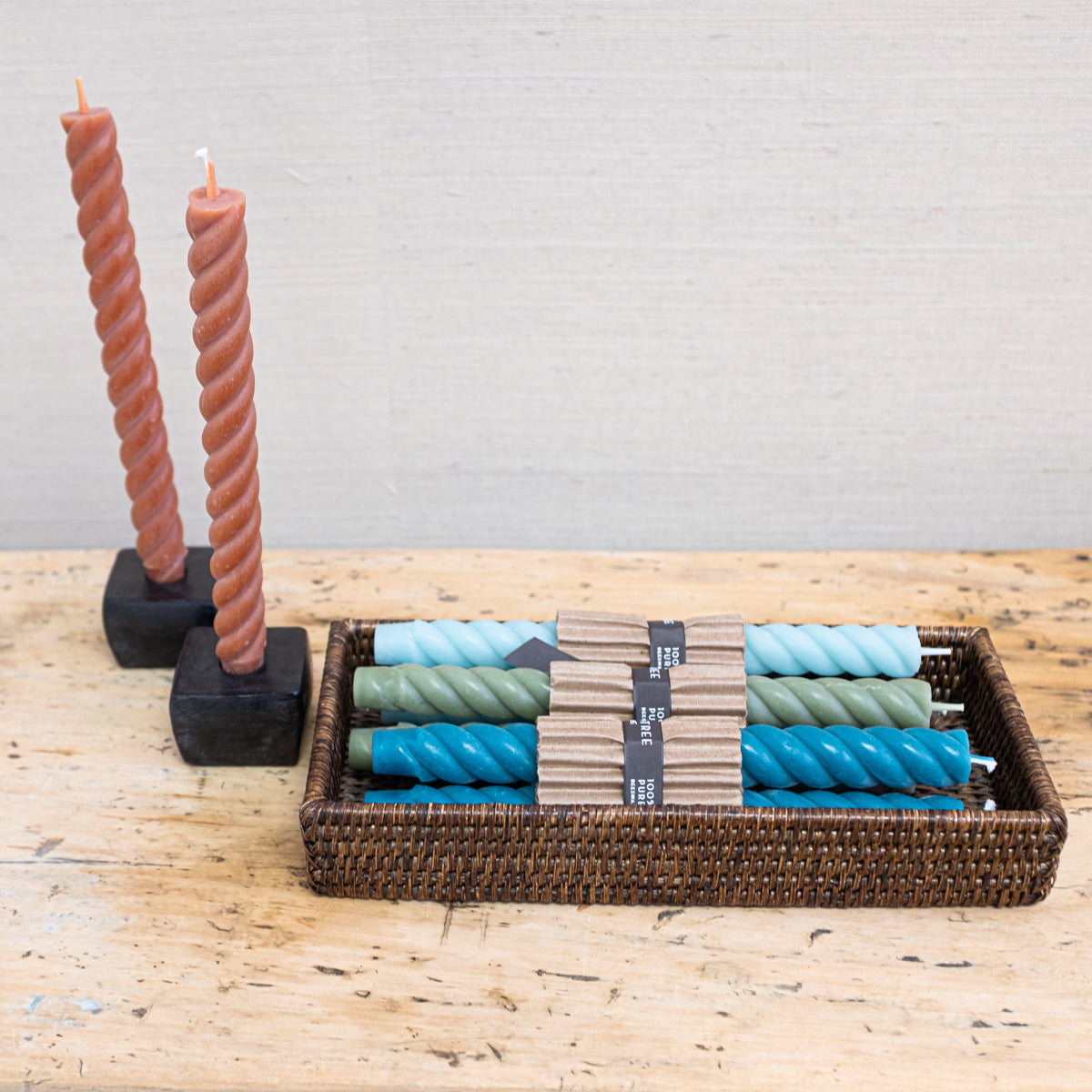 terra cotta color candles in holders with other color options